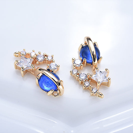 10 doppelt geschlungene Stern-Saturn-Charm-Verbindungsstücke mit Strasssteinen, verziert aus 14-karätigem GF