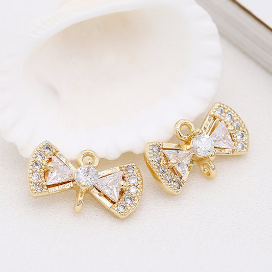 2 connecteurs de charme nœud papillon à double boucle ornés de strass 14K GF