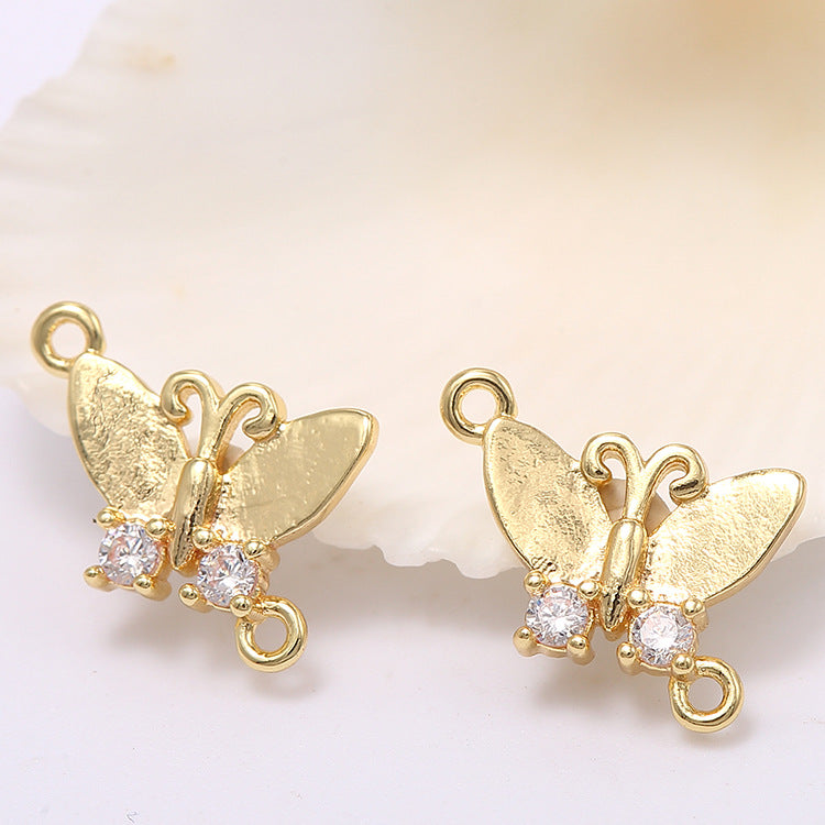2 connecteurs papillon à double boucle ornés de strass 14K GF