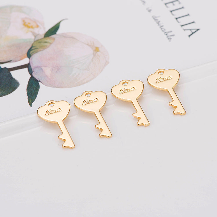 10 pendentif de charme de petite clé 14K GF