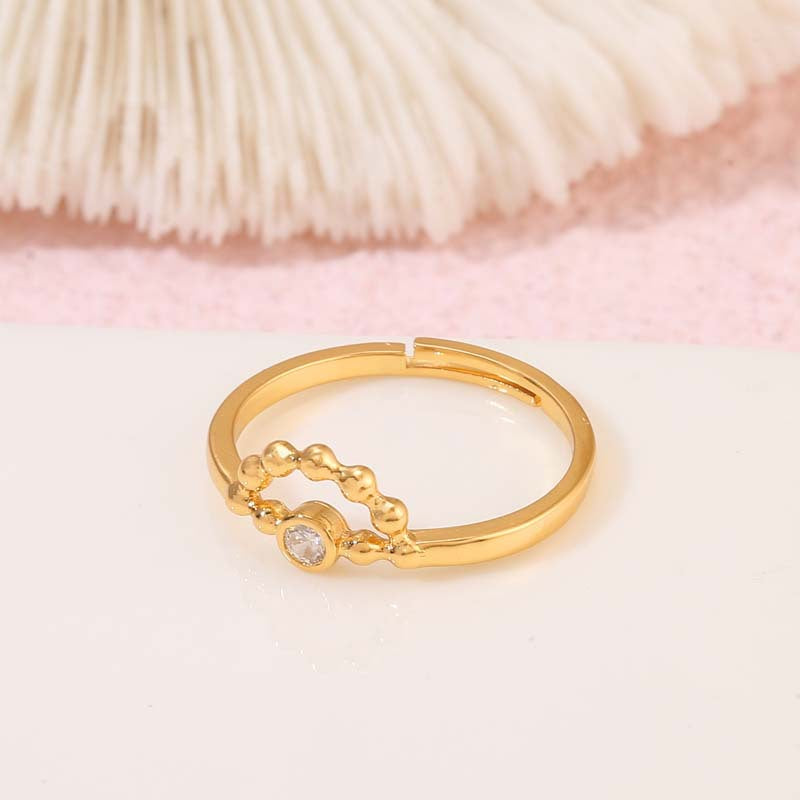 2 Kompass-Statement-Ringe mit offenem Kreis, 14 Karat GF, mit Strasssteinen verziert