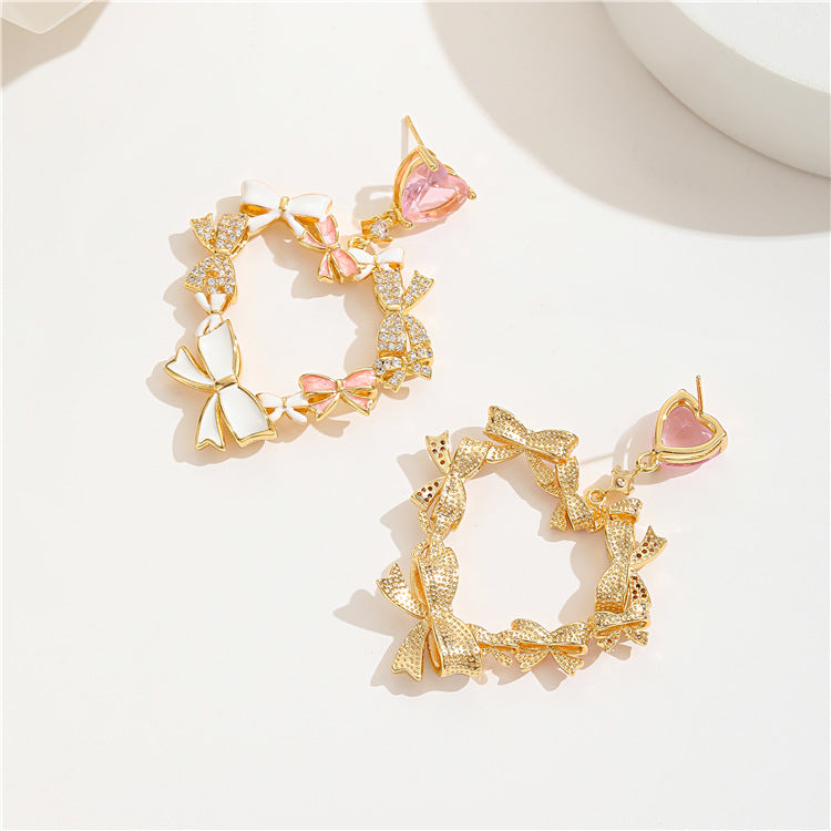 4 boucles d'oreilles à breloques en forme de cœur avec nœud papillon ornées de strass 14K GF