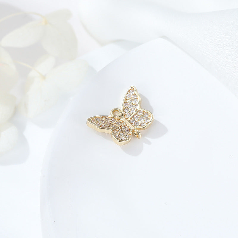 2 connecteurs de charme papillon à double boucle ornés de strass 14K GF