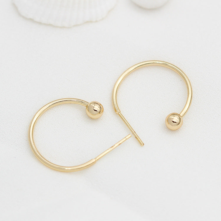 10 Ohrstecker mit runden Perlenenden, 14 Karat GF