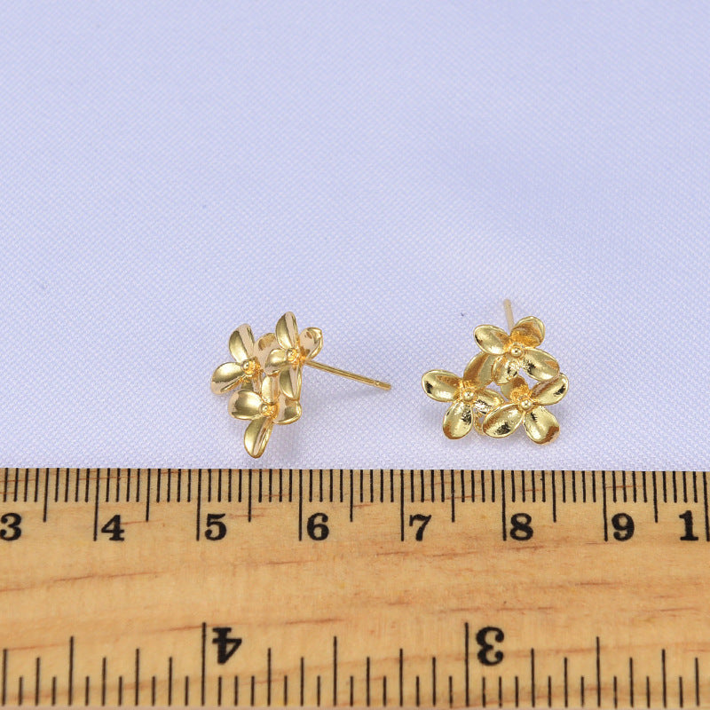 20 Blumen-Ohrstecker mit Öse, 14 K GF