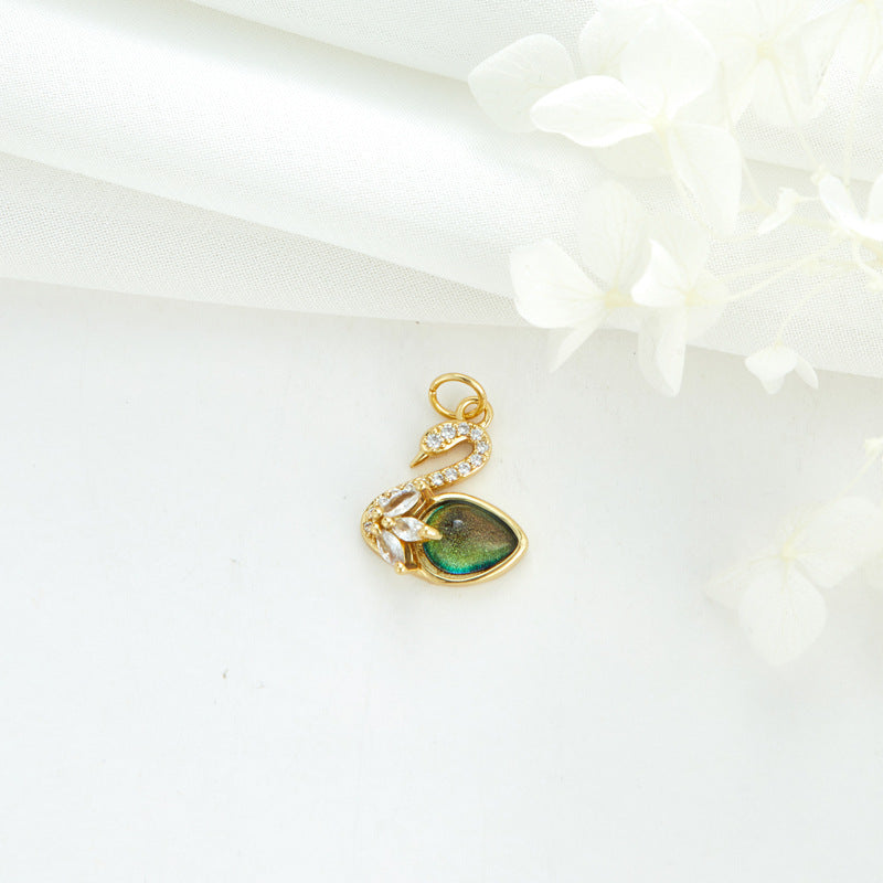 2 Cateye-Steine, Astronaut auf Mond, Rakete, Schwan, Katze, Charm-Anhänger, Harz, Strass, verziert, 14 K GF